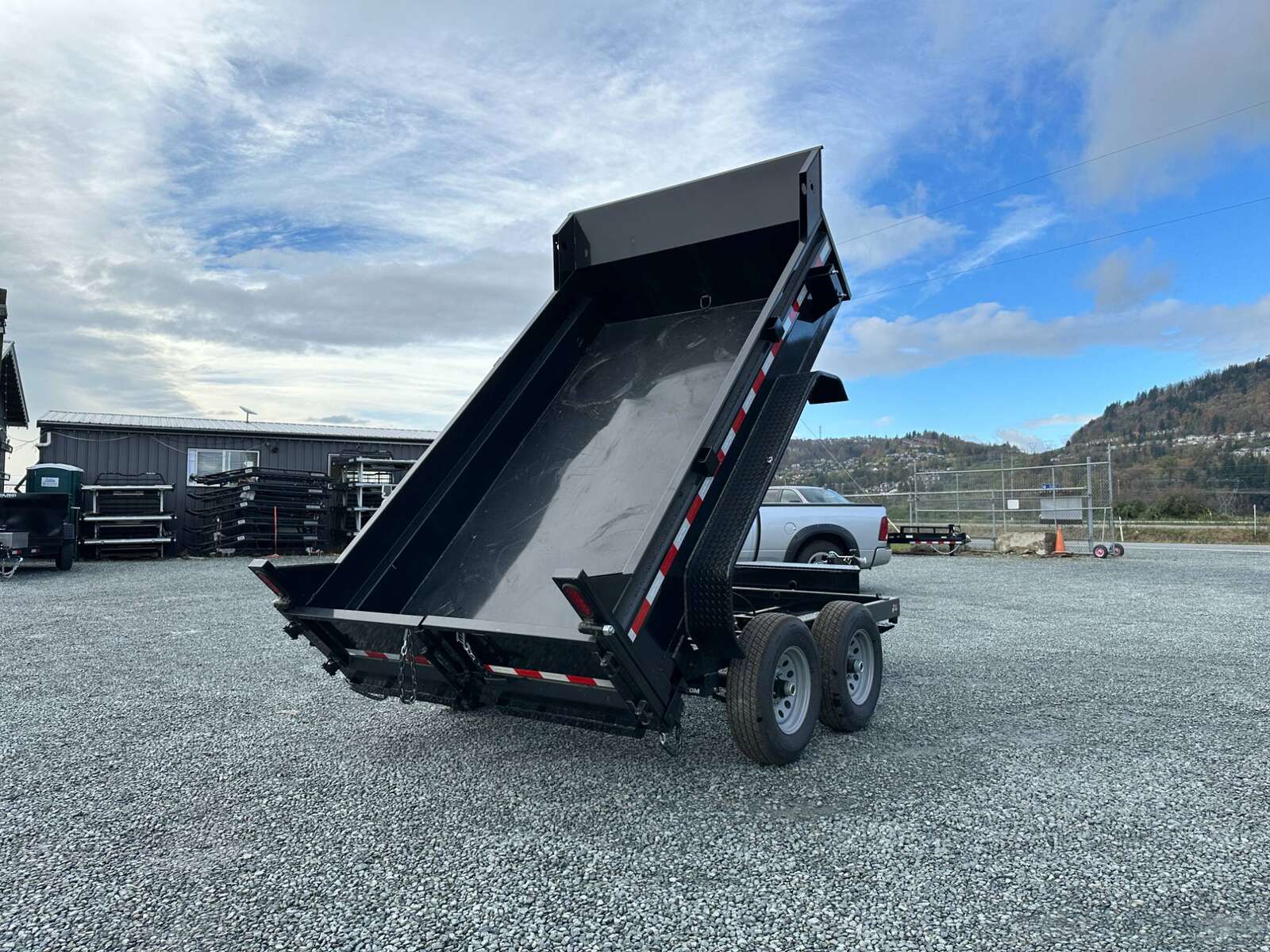 Photo of 2024 Suretrac 6x10 Dump Trailer 9,900lbs GVW w/Ramps