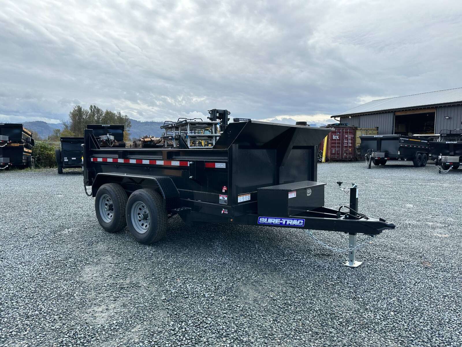 Photo of 2024 Suretrac 6x10 Dump Trailer 9,900lbs GVW w/Ramps