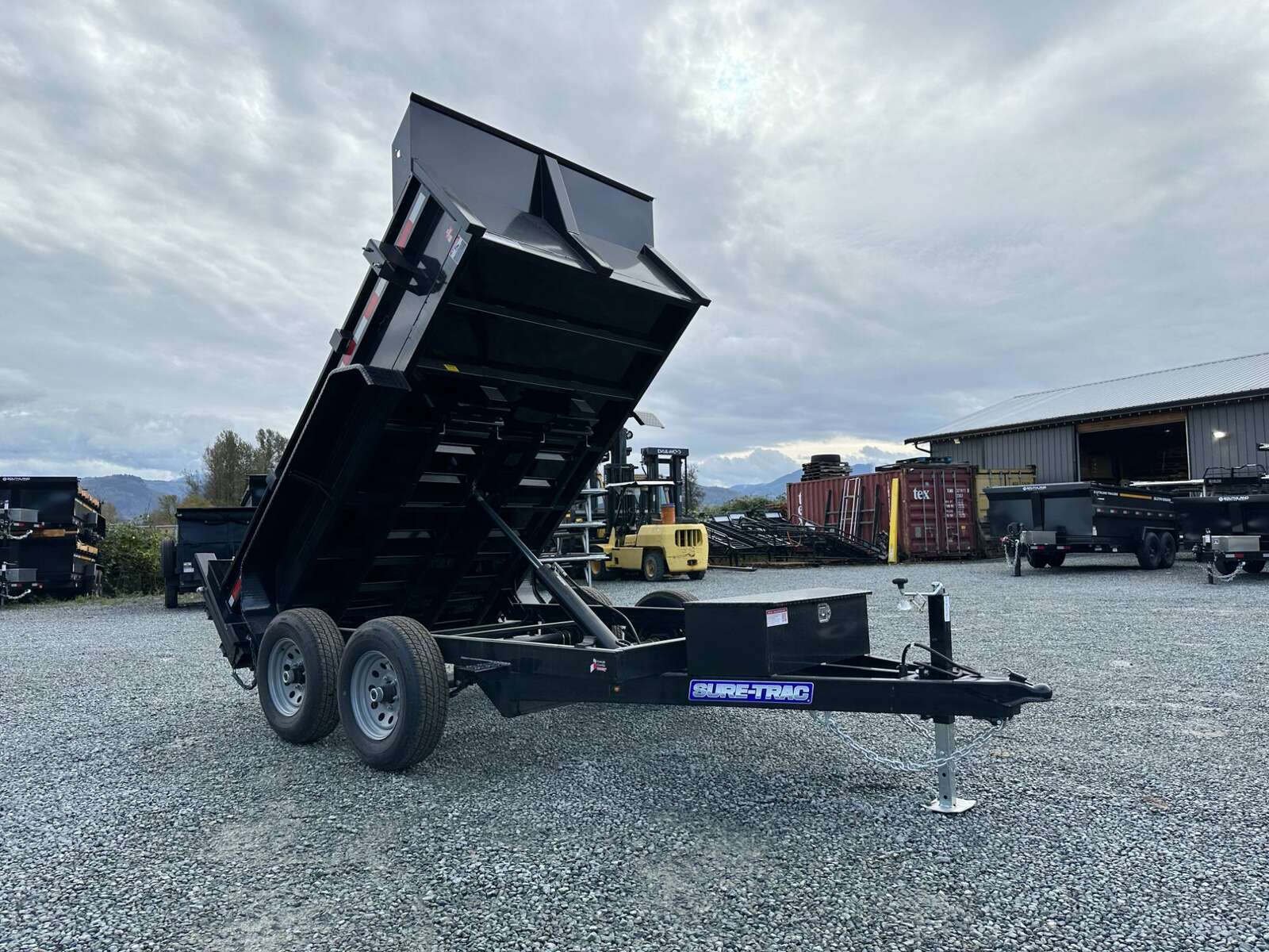 Photo of 2024 Suretrac 6x10 Dump Trailer 9,900lbs GVW w/Ramps