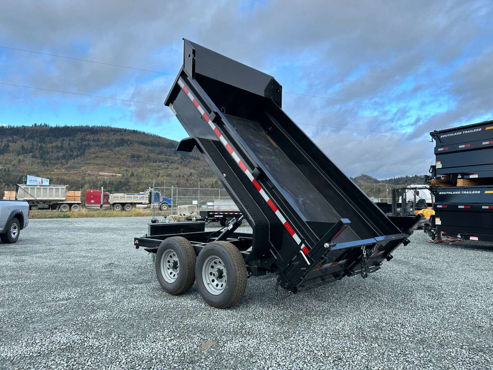 Photo of 2024 Suretrac 6x10 Dump Trailer 9,900lbs GVW w/Ramps