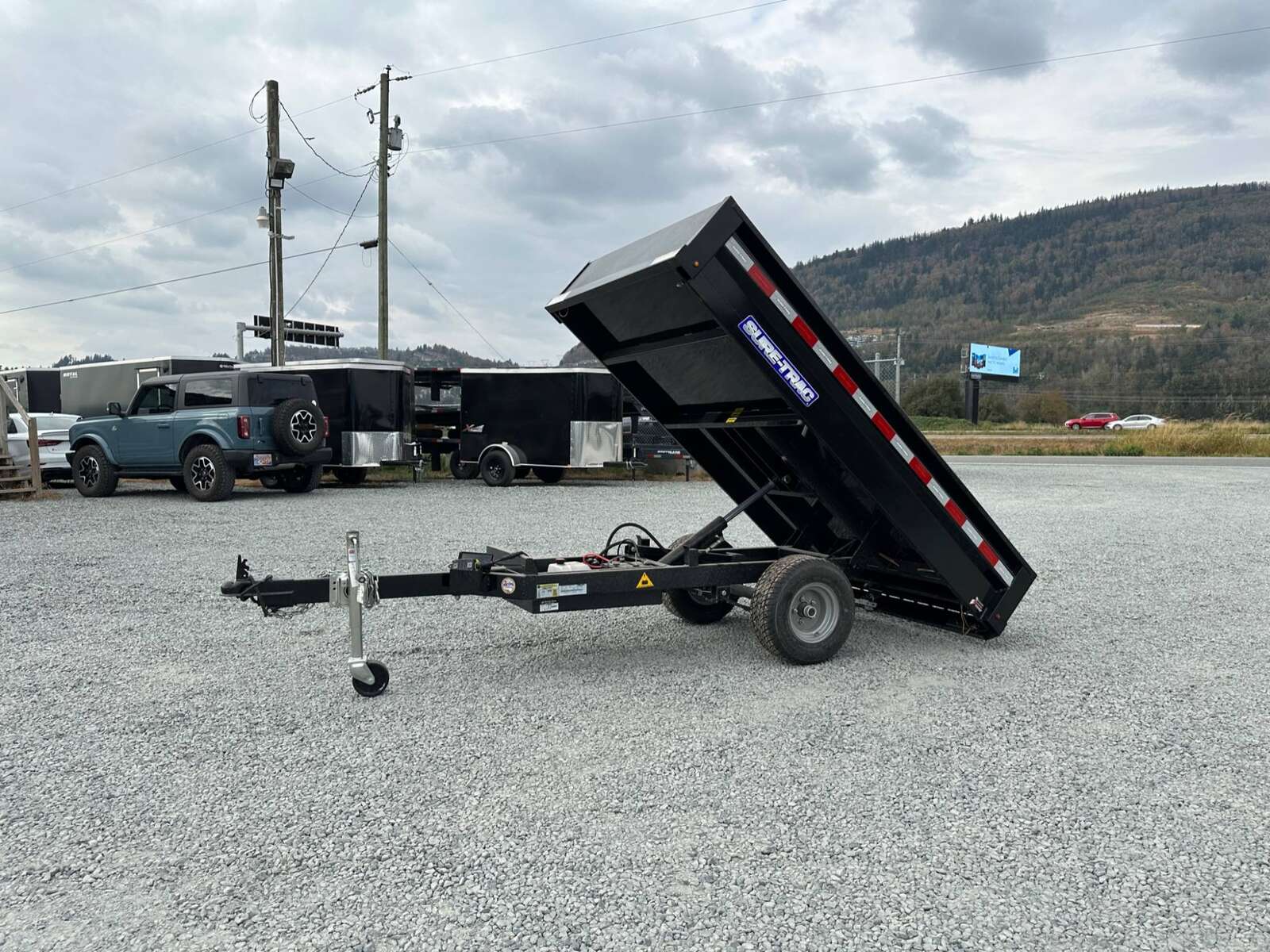 Photo of New SureTrac 4.5 x 8 Mini Dump Trailer Utility 2990lb GVW