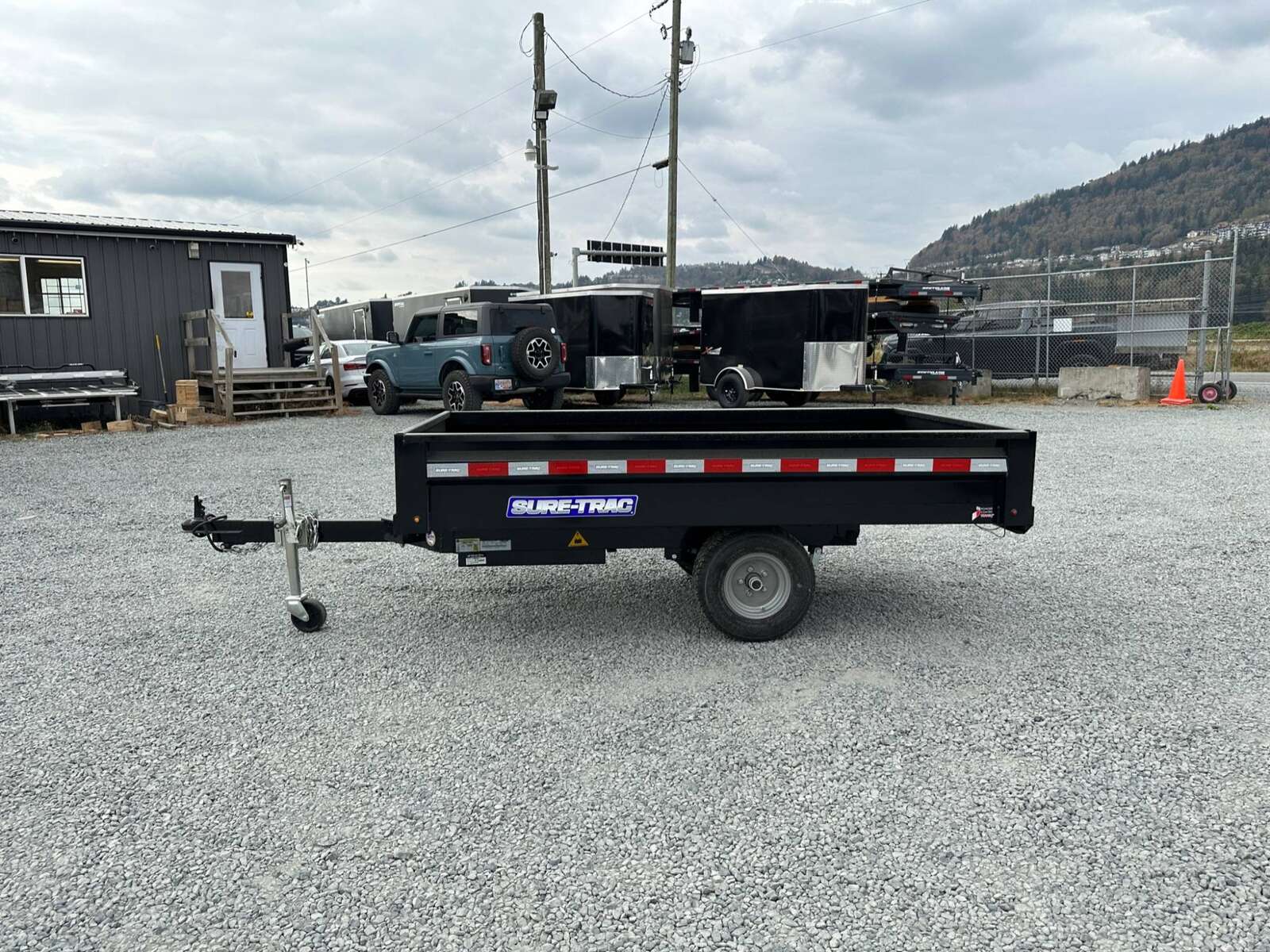 Photo of New SureTrac 4.5 x 8 Mini Dump Trailer Utility 2990lb GVW