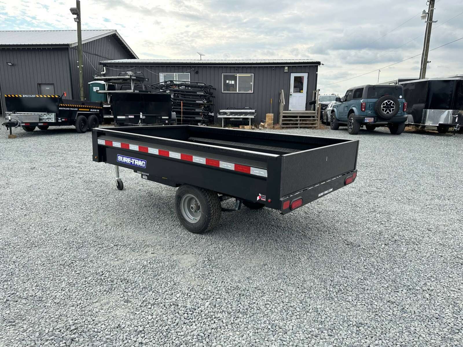 Photo of New SureTrac 4.5 x 8 Mini Dump Trailer Utility 2990lb GVW