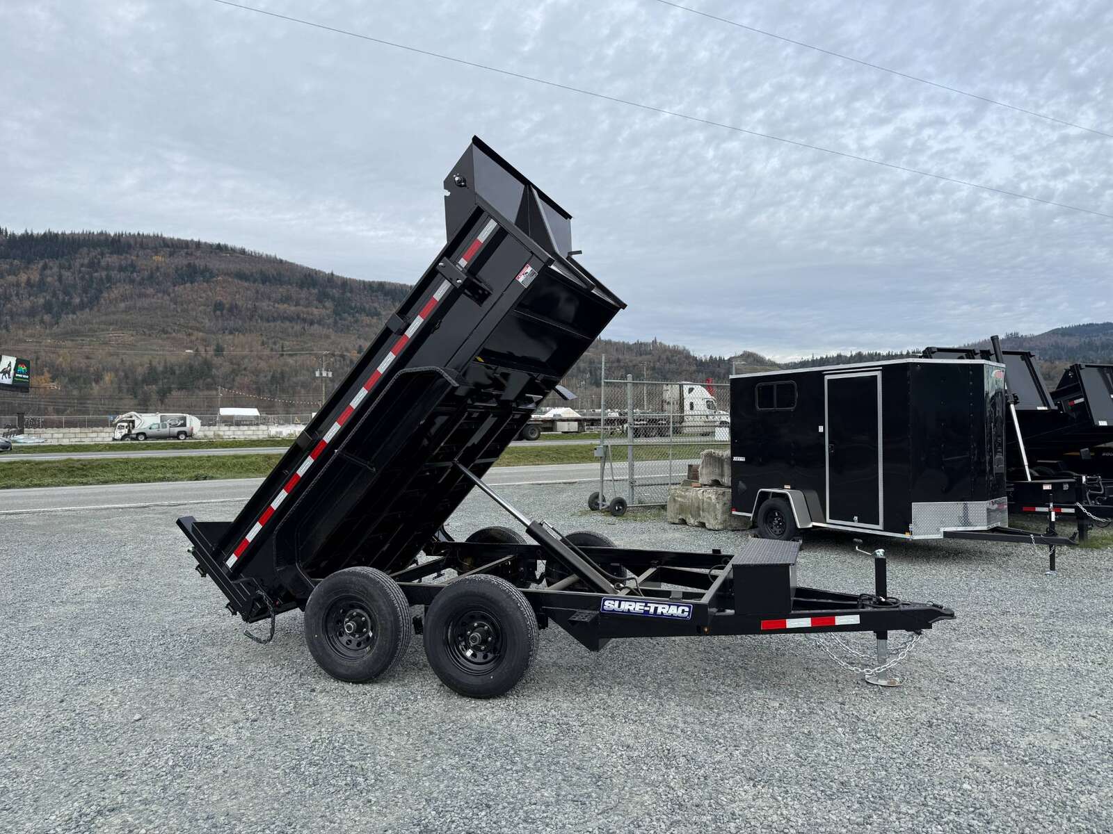 Photo of 2024 Suretrac 6x10 Dump Trailer 9,900lbs GVW w/Ramps & Tarp Installed