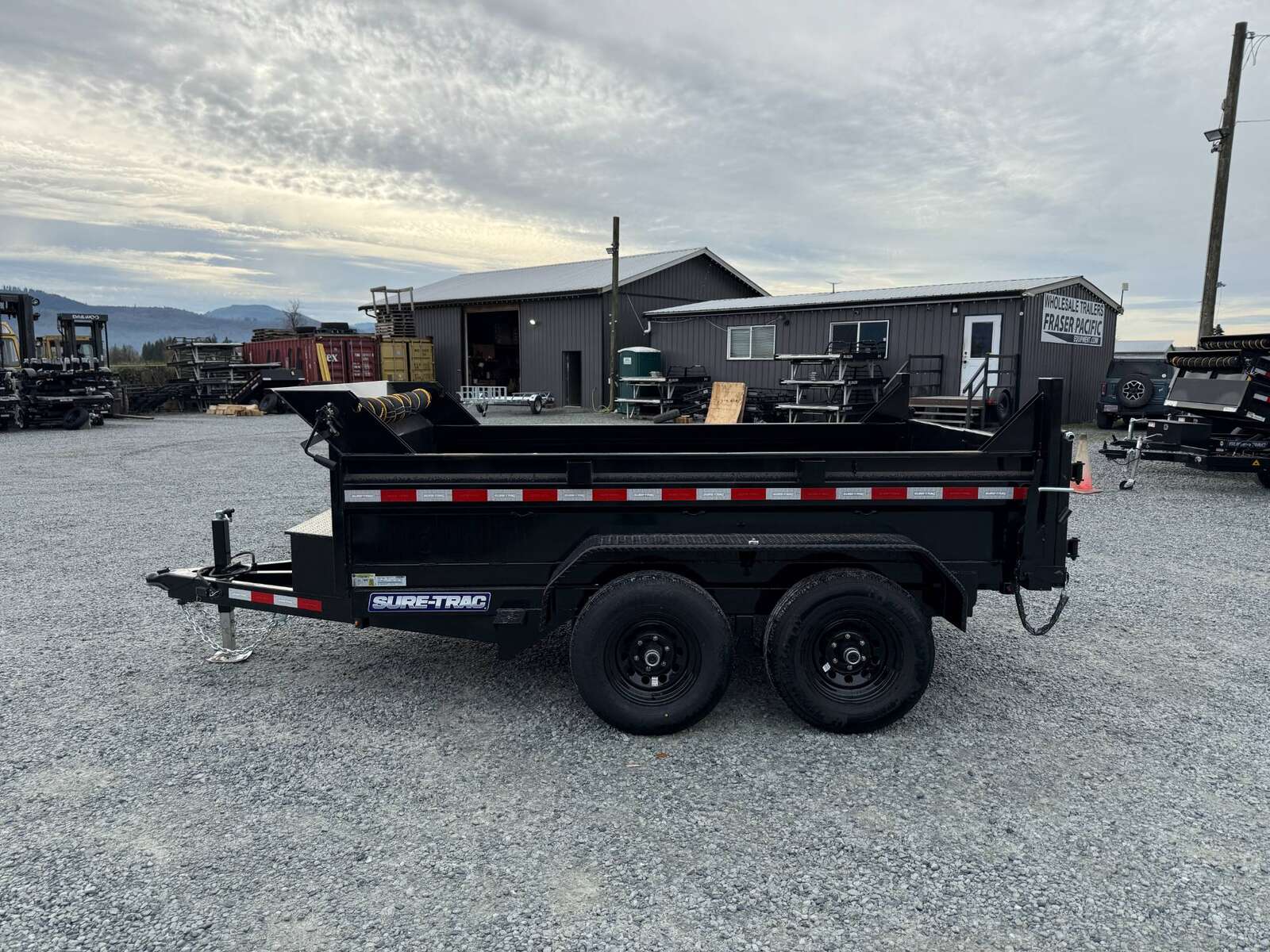 Photo of 2024 Suretrac 6x10 Dump Trailer 9,900lbs GVW w/Ramps & Tarp Installed