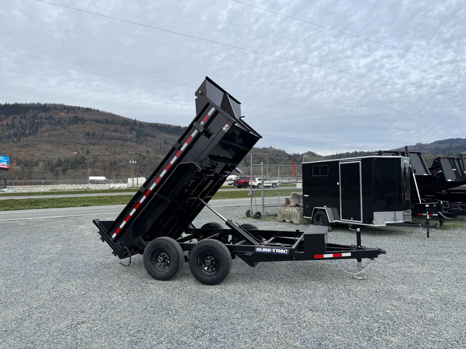 Photo of 2024 Suretrac 6x10 Dump Trailer 9,900lbs GVW w/Ramps & Tarp Installed