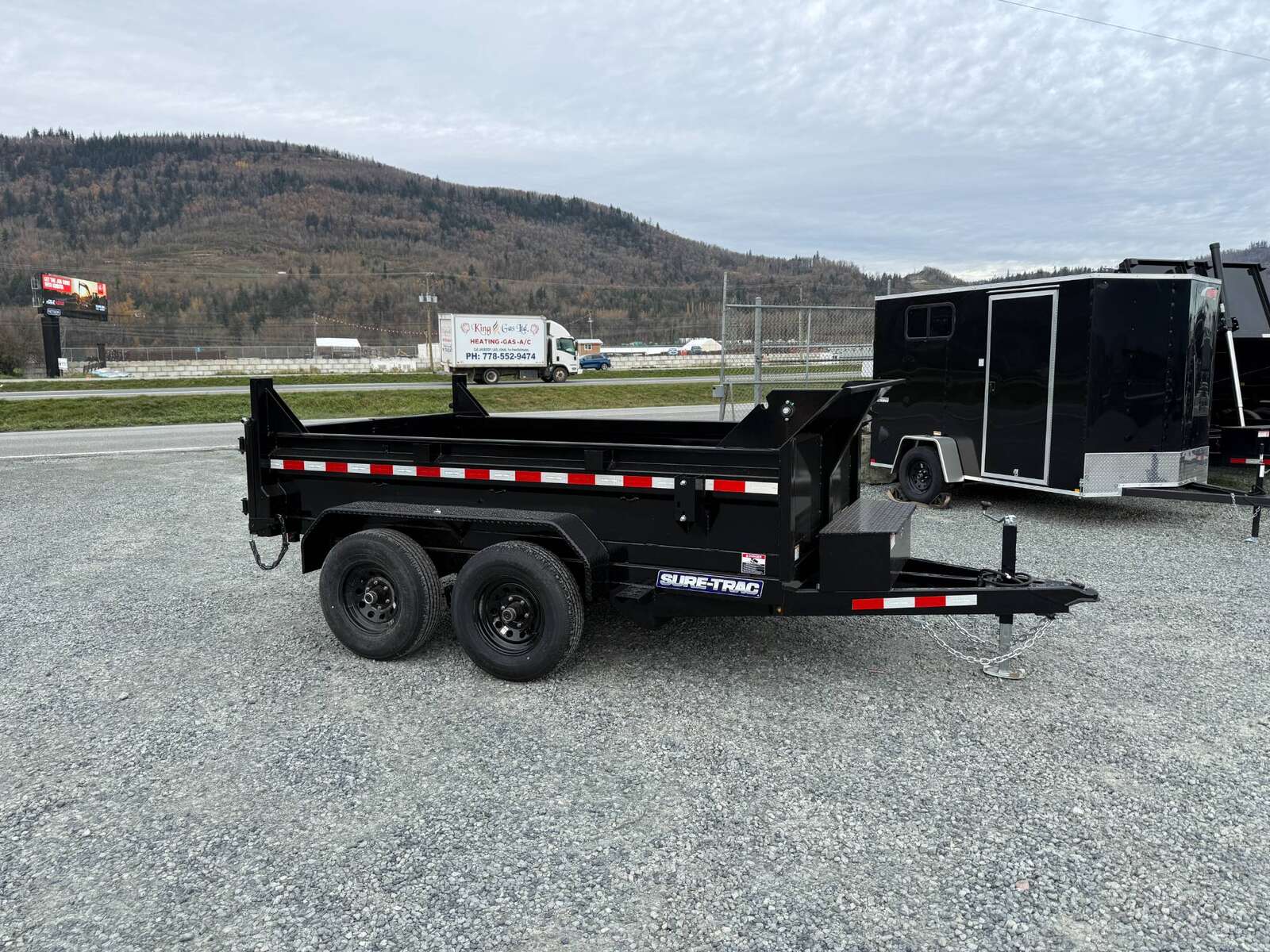 Photo of 2024 Suretrac 6x10 Dump Trailer 9,900lbs GVW w/Ramps & Tarp Installed