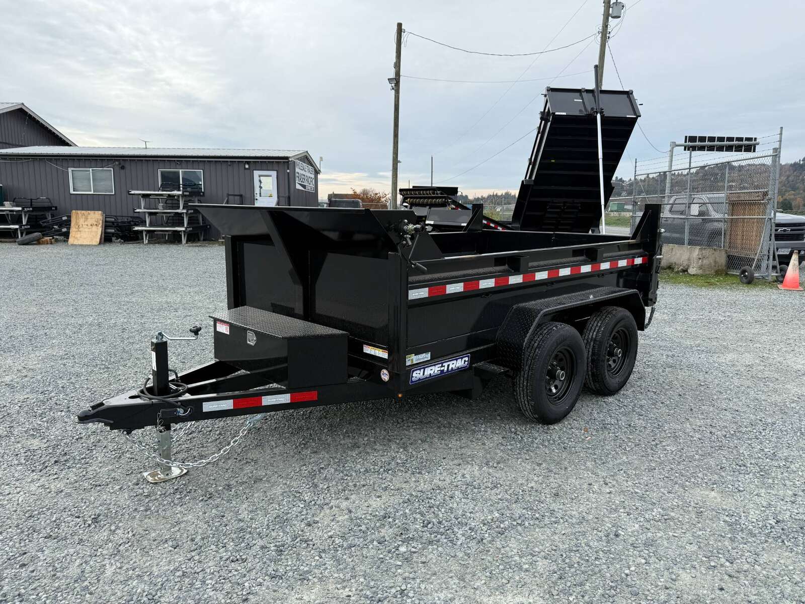 Photo of 2024 Suretrac 6x10 Dump Trailer 9,900lbs GVW w/Ramps & Tarp Installed