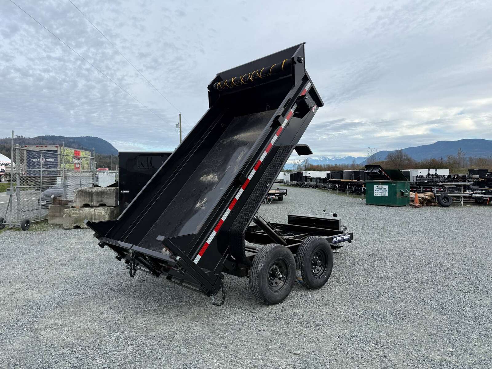 Photo of 2024 Suretrac 6x10 Dump Trailer 9,900lbs GVW w/Ramps & Tarp Installed