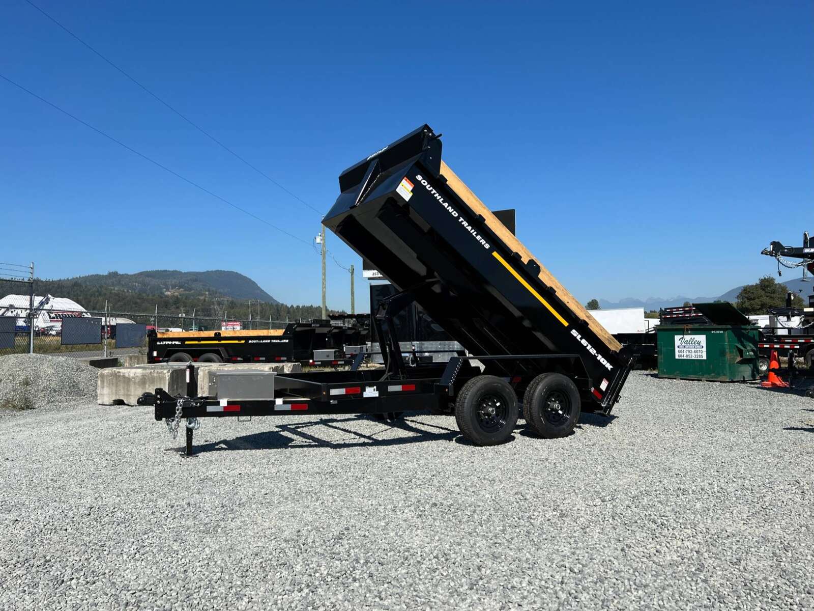 Photo of 2025 Southland 6X12 Dump Trailer 11,400LB GVW with Tarp and Ramps