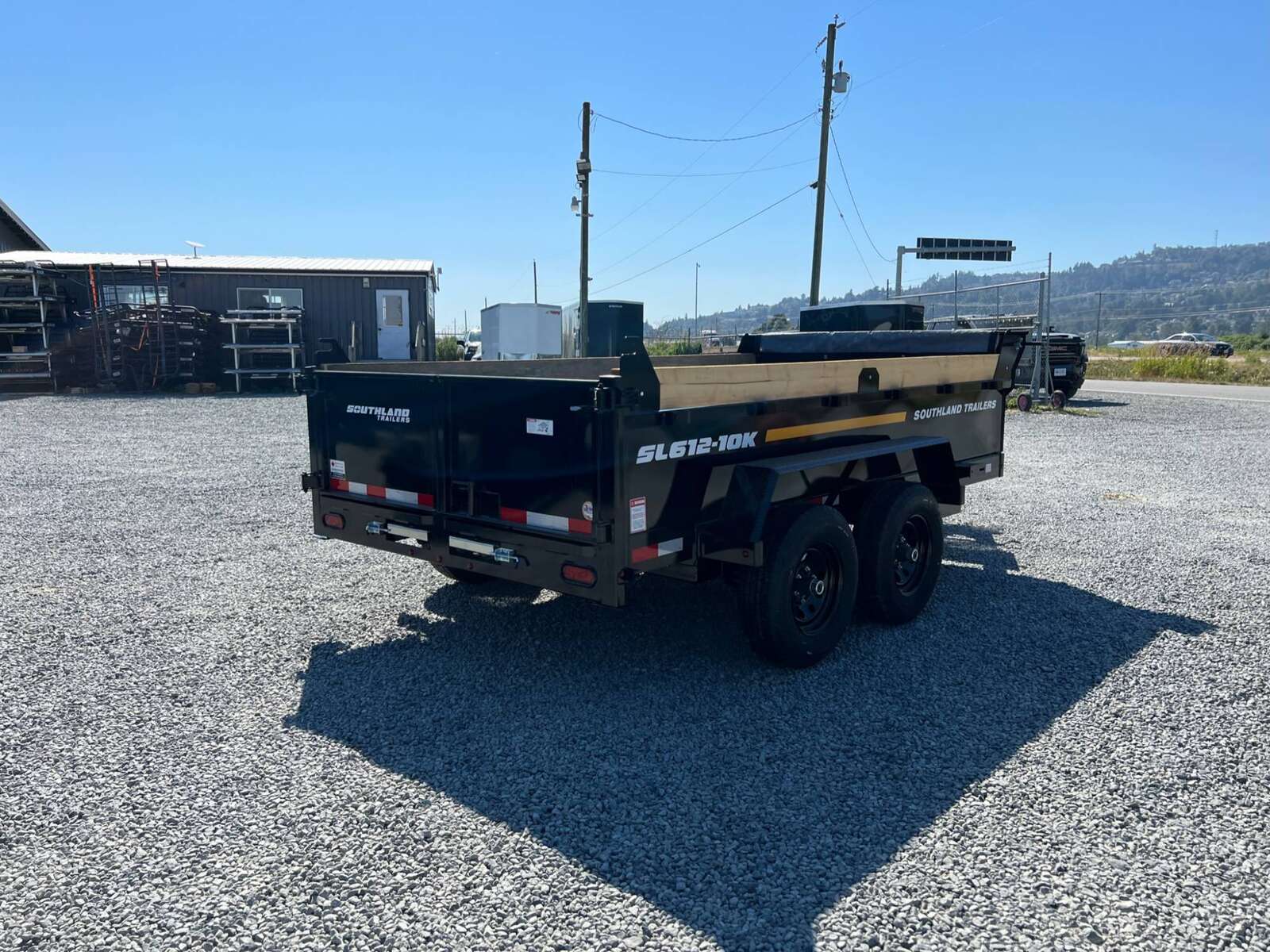 Photo of 2025 Southland 6X12 Dump Trailer 11,400LB GVW with Tarp and Ramps