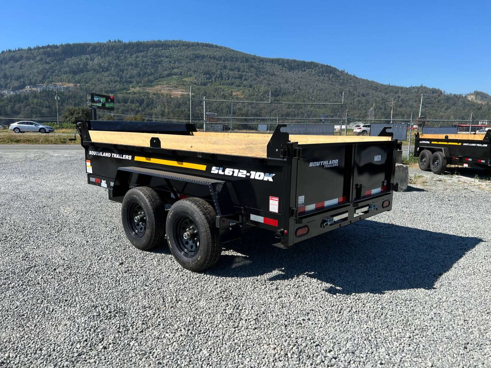 Photo of 2025 Southland 6X12 Dump Trailer 11,400LB GVW with Tarp and Ramps