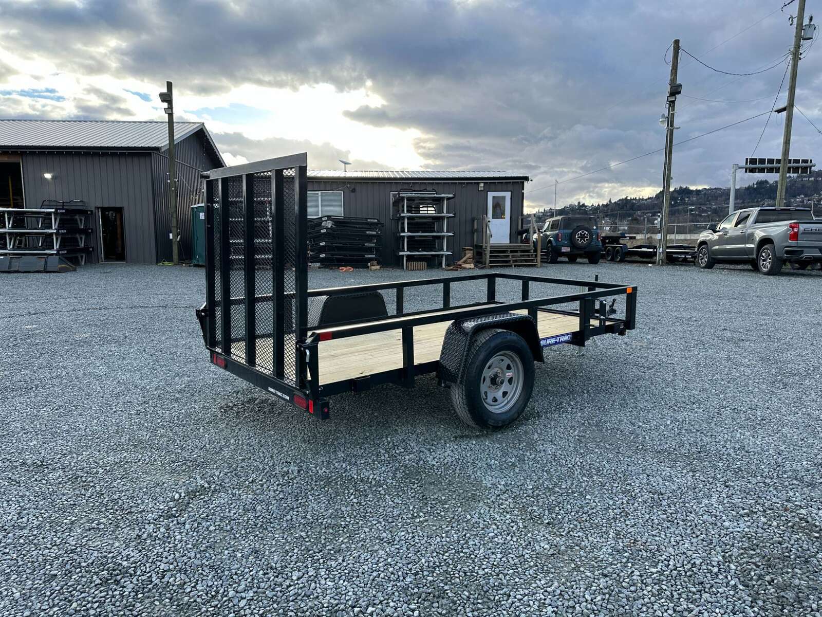 Photo of 2025 Suretrac 5X10 Utility Trailer 2990lb GVW with Ramp Gate