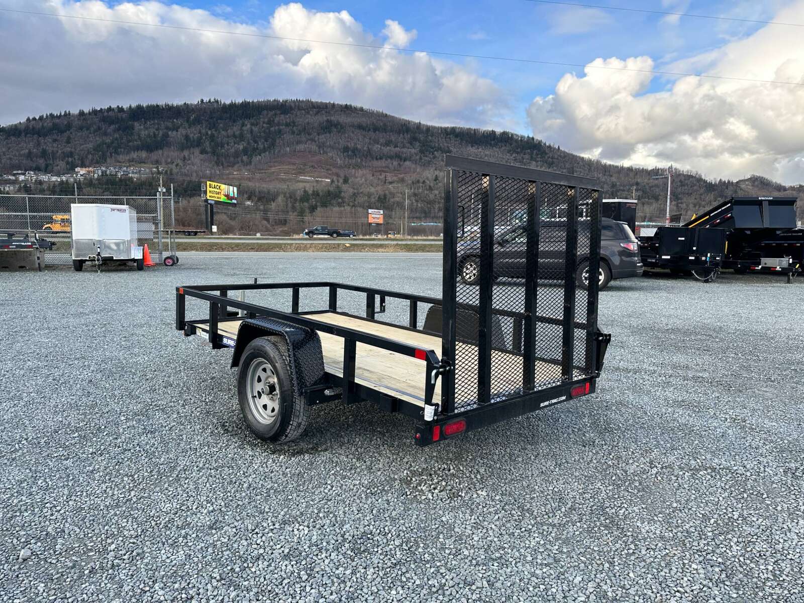 Photo of 2025 Suretrac 5X10 Utility Trailer 2990lb GVW with Ramp Gate