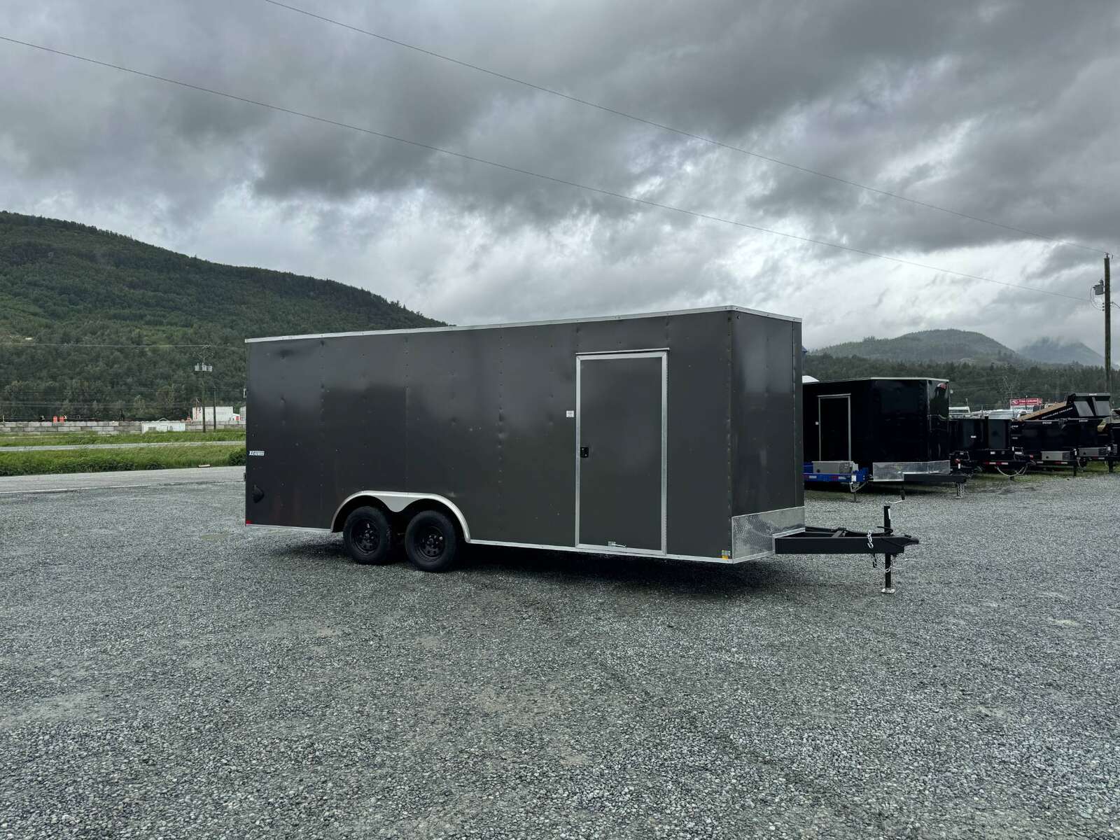 Photo of 2025 Mirage XE 8.5x20 V Nose Cargo / Enclosed Trailer Extra Height Ramp Door Charcoal Grey Car Hauler Package