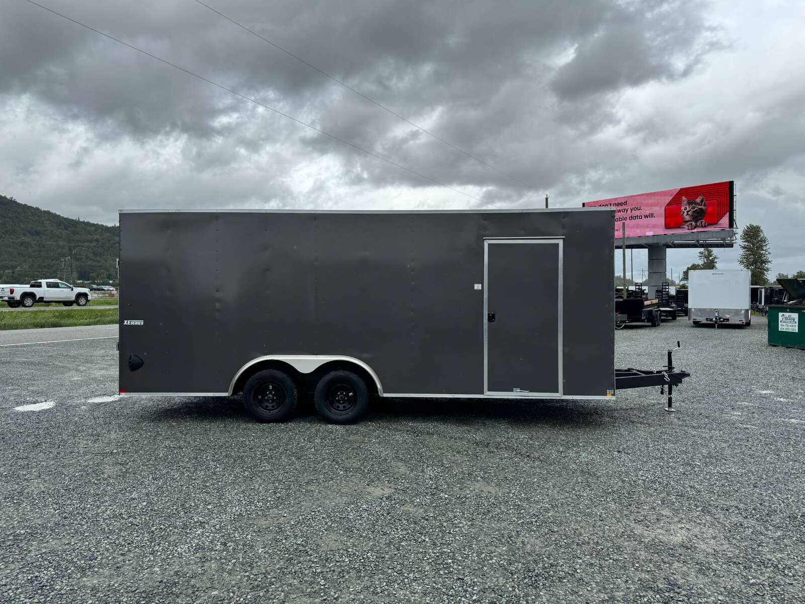 Photo of 2025 Mirage XE 8.5x20 V Nose Cargo / Enclosed Trailer Extra Height Ramp Door Charcoal Grey Car Hauler Package