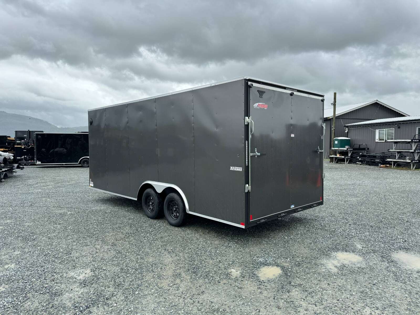 Photo of 2025 Mirage XE 8.5x20 V Nose Cargo / Enclosed Trailer Extra Height Ramp Door Charcoal Grey Car Hauler Package