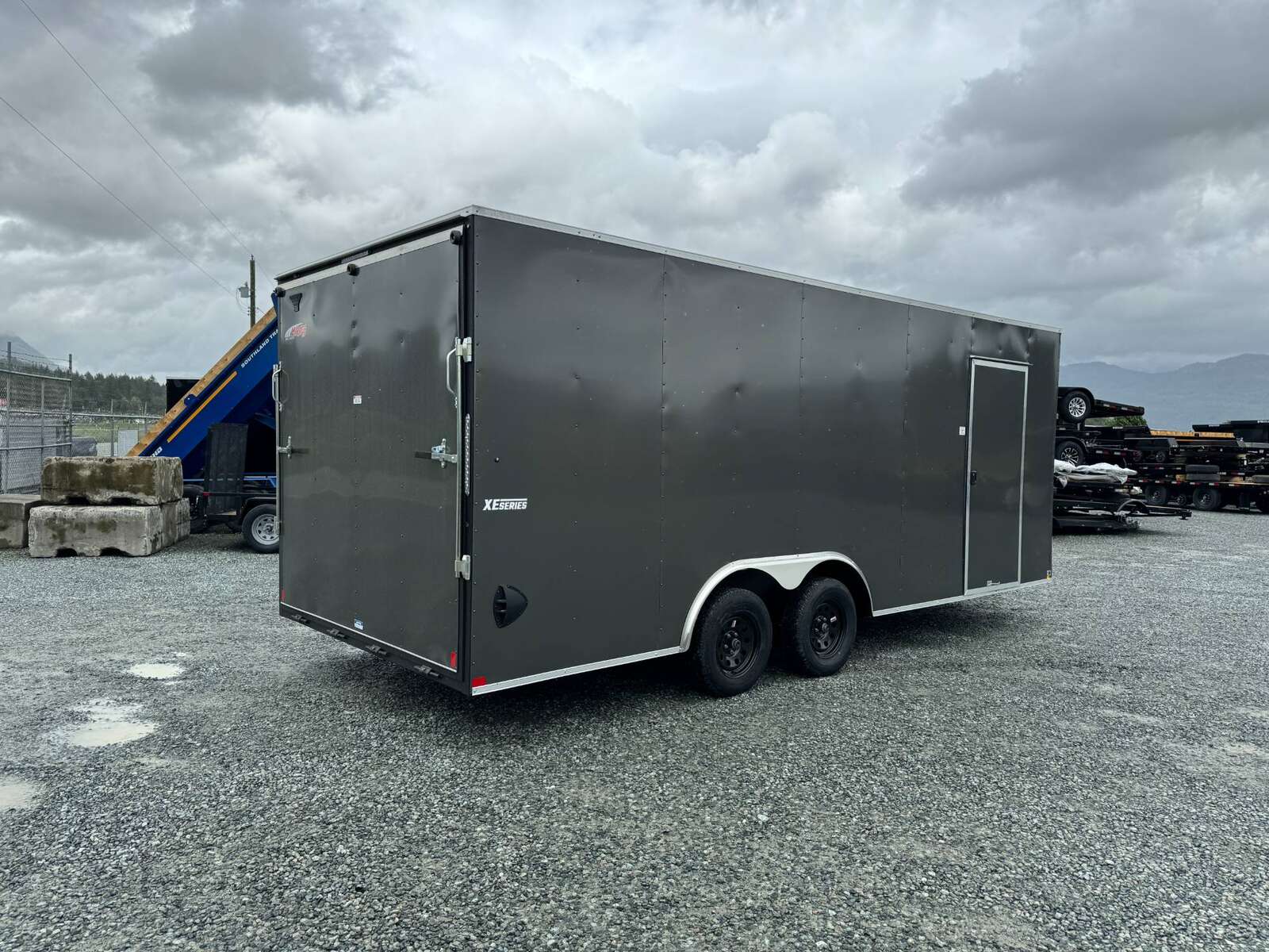 Photo of 2025 Mirage XE 8.5x20 V Nose Cargo / Enclosed Trailer Extra Height Ramp Door Charcoal Grey Car Hauler Package