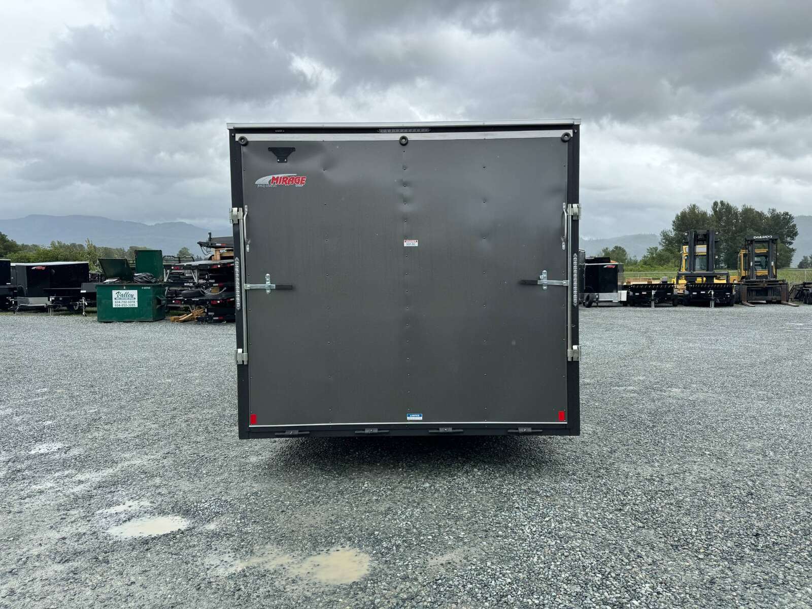 Photo of 2025 Mirage XE 8.5x20 V Nose Cargo / Enclosed Trailer Extra Height Ramp Door Charcoal Grey Car Hauler Package