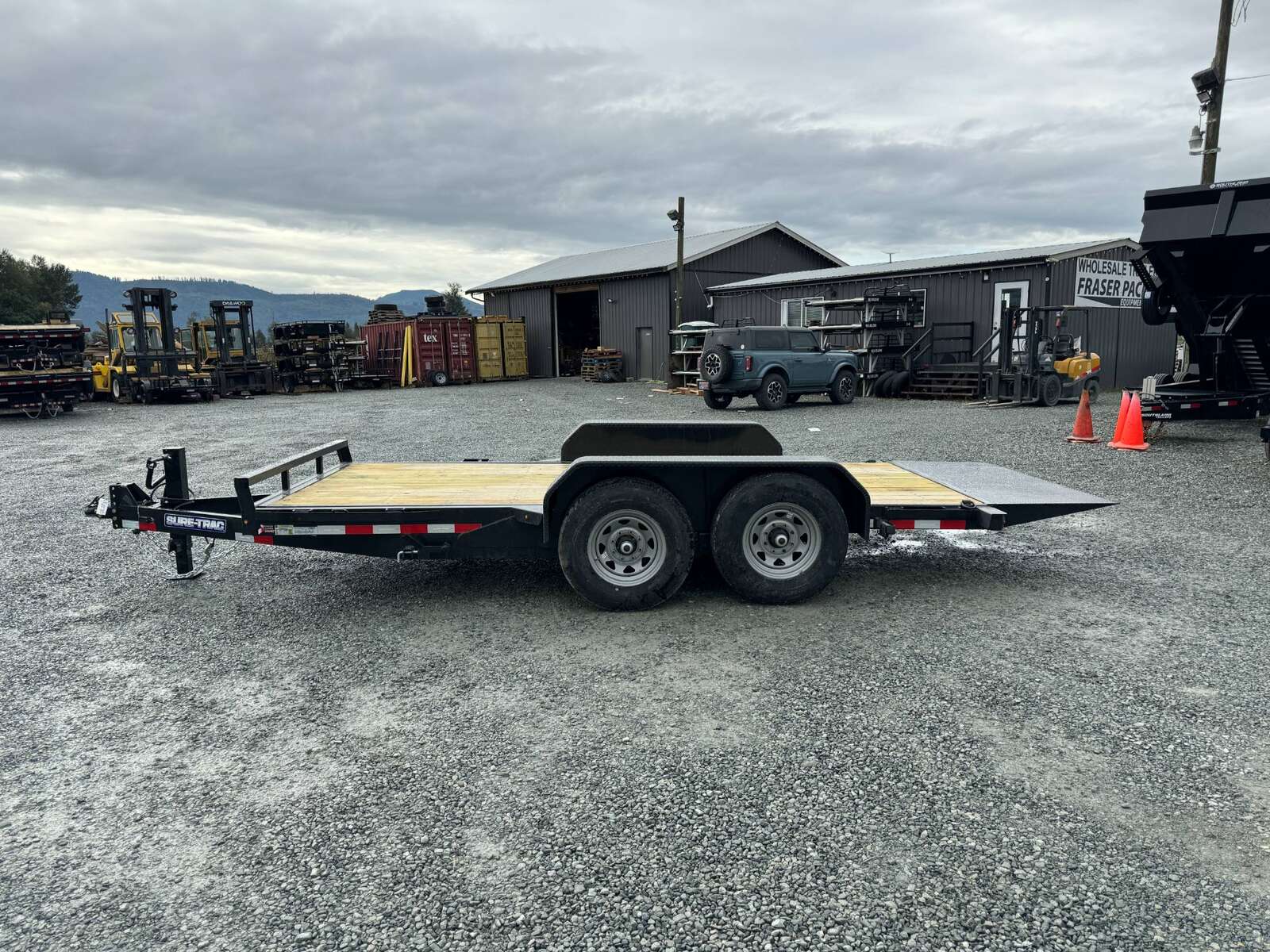 Photo of New Suretrac 7x16 HD Tilt Deck Equipment Trailer 14,000lb GVW