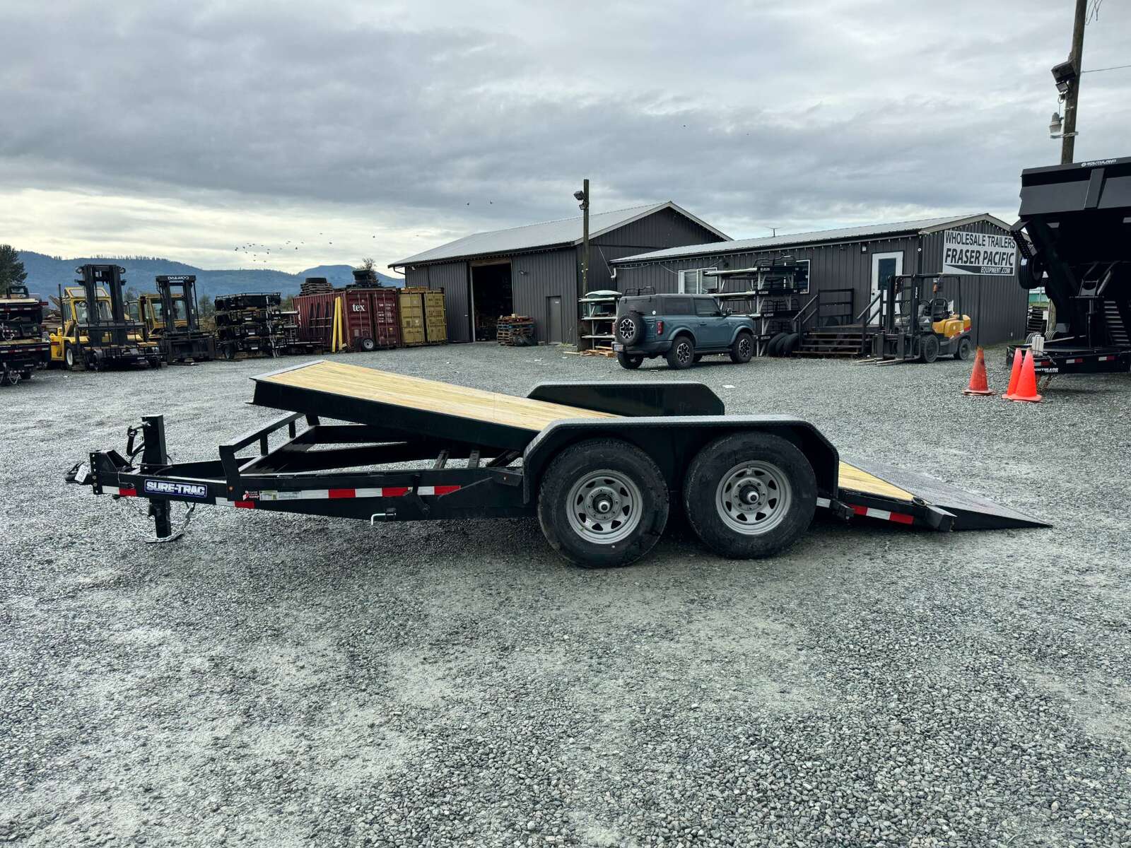 Photo of New Suretrac 7x16 HD Tilt Deck Equipment Trailer 14,000lb GVW