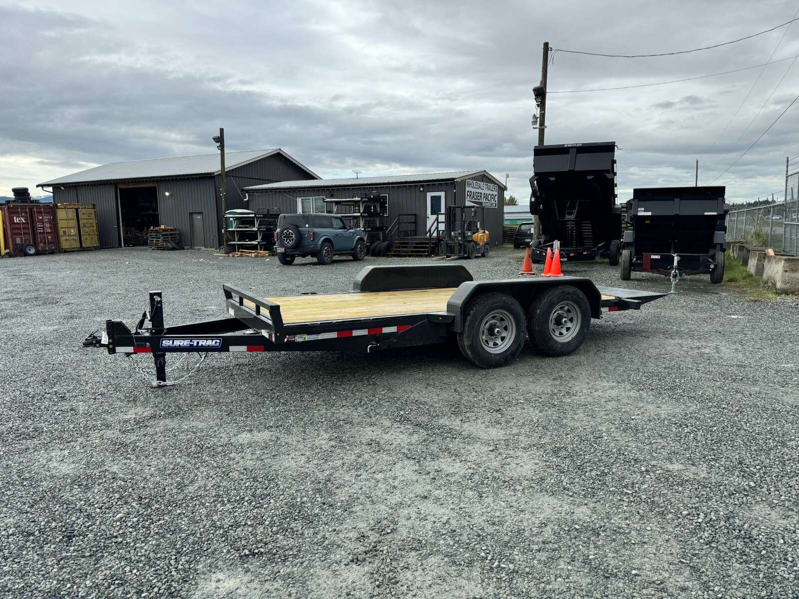 Photo of New Suretrac 7x16 HD Tilt Deck Equipment Trailer 14,000lb GVW