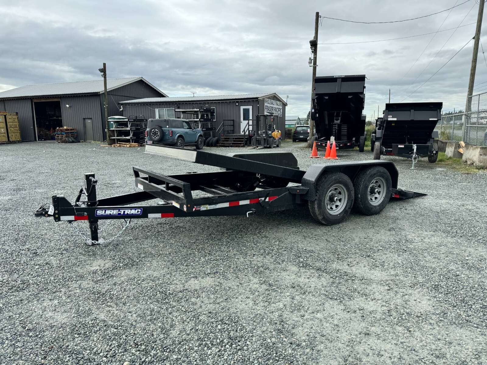 Photo of New Suretrac 7x16 HD Tilt Deck Equipment Trailer 14,000lb GVW