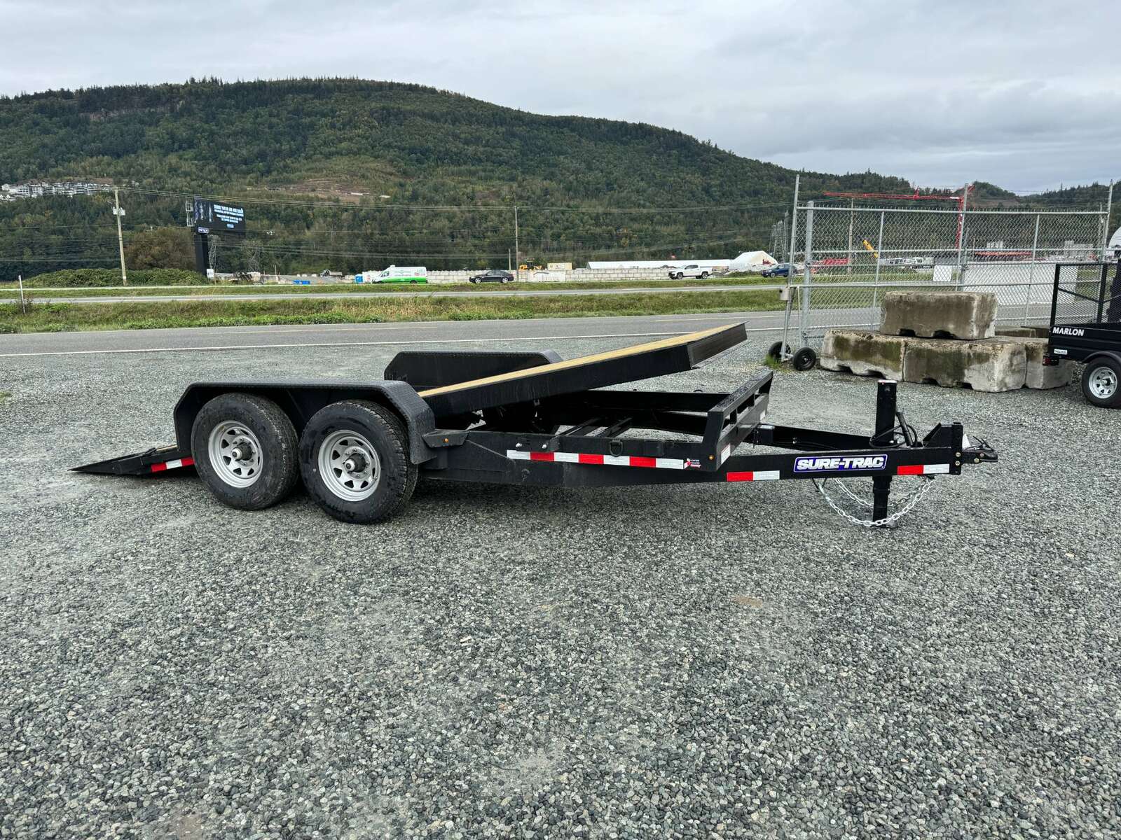 Photo of New Suretrac 7x16 HD Tilt Deck Equipment Trailer 14,000lb GVW