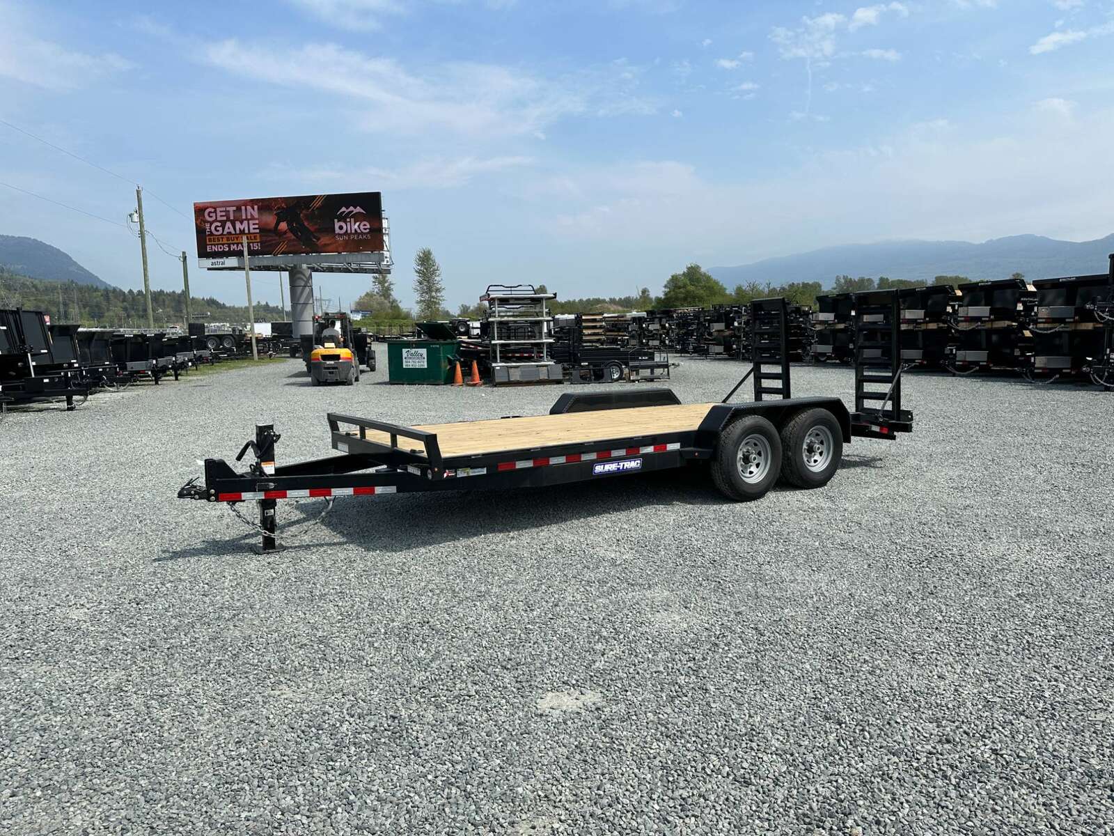 Photo of 2025 Suretrac 7x18 Equipment Trailer 14,000LB GVW Implement Flat Deck w/ Stand Up Ramps