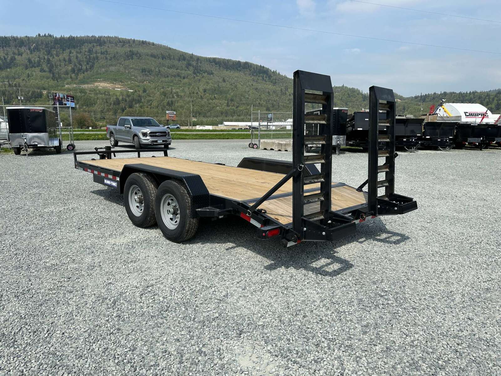 Photo of 2025 Suretrac 7x18 Equipment Trailer 14,000LB GVW Implement Flat Deck w/ Stand Up Ramps