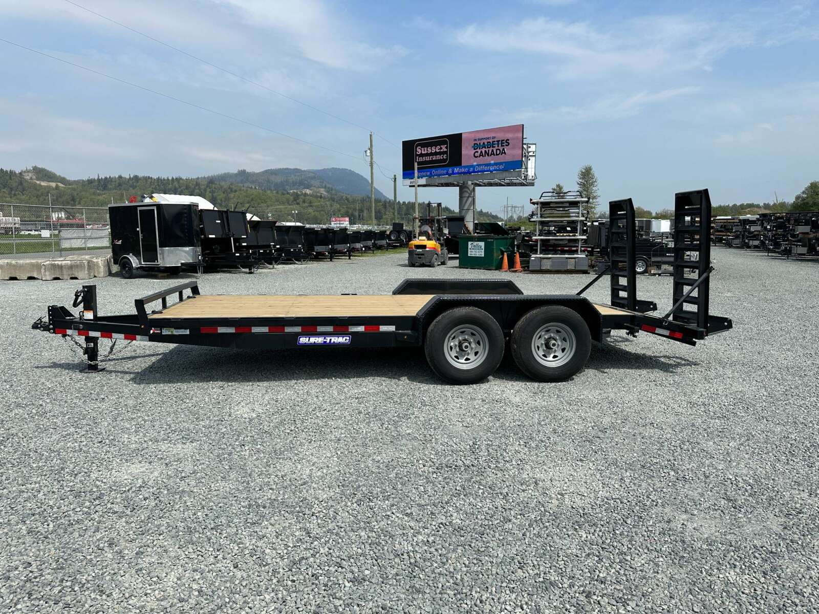 Photo of 2025 Suretrac 7x18 Equipment Trailer 14,000LB GVW Implement Flat Deck w/ Stand Up Ramps