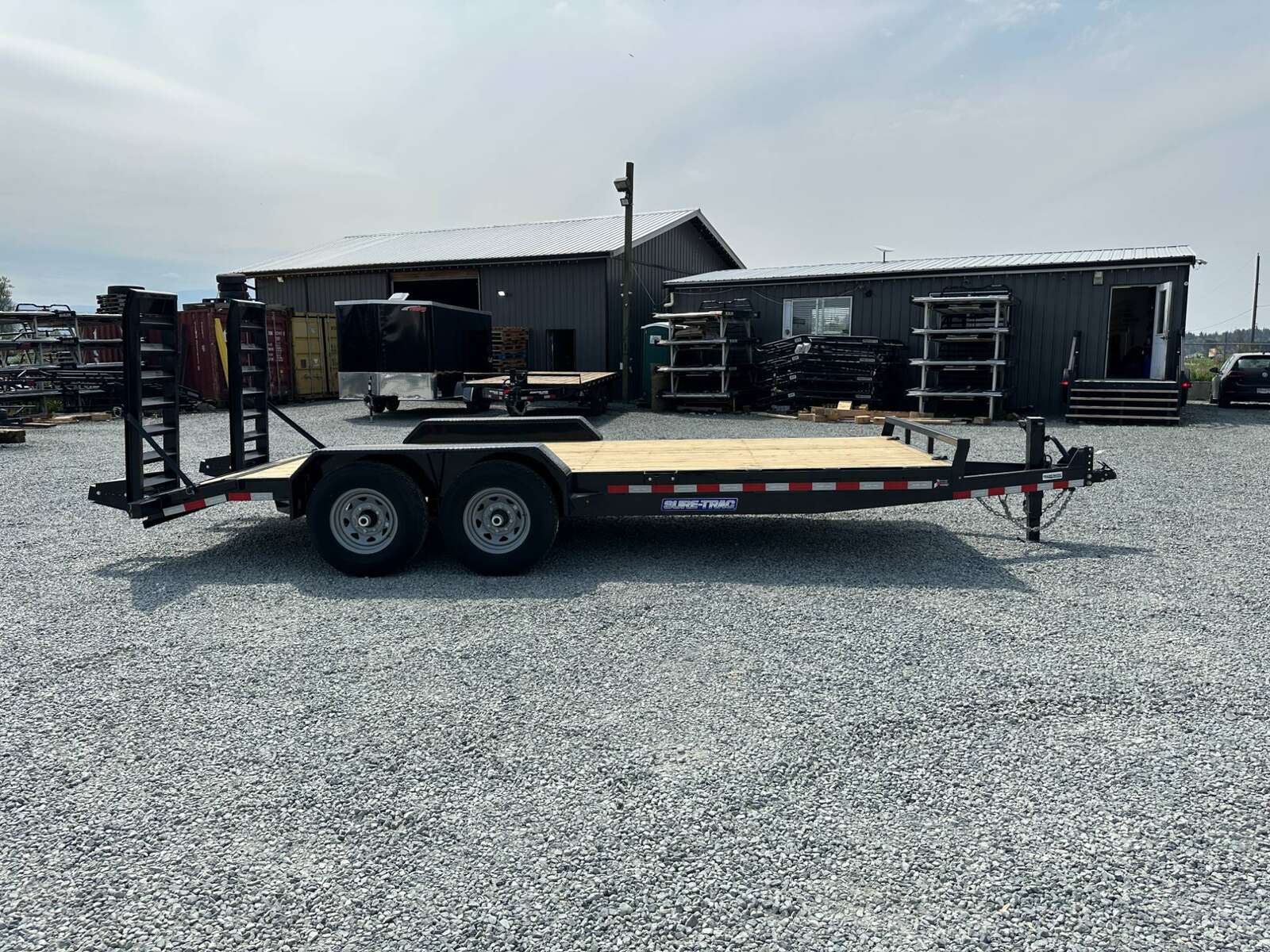 Photo of 2025 Suretrac 7x18 Equipment Trailer 14,000LB GVW Implement Flat Deck w/ Stand Up Ramps