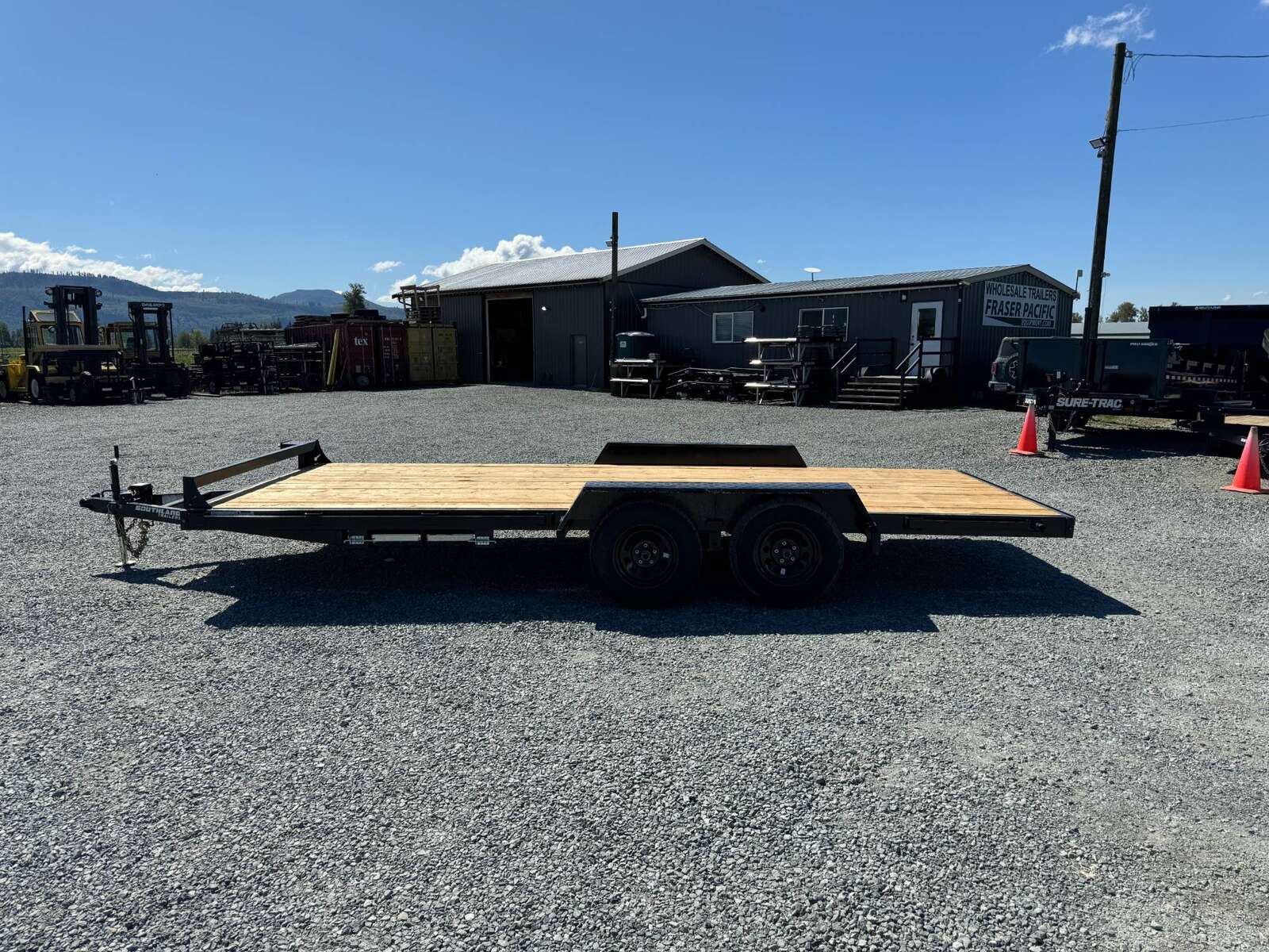 Photo of 2024 Southland 7X18 CAR TRAILER FLAT DECK 7,700LB GVW w/ Slide in Ramps