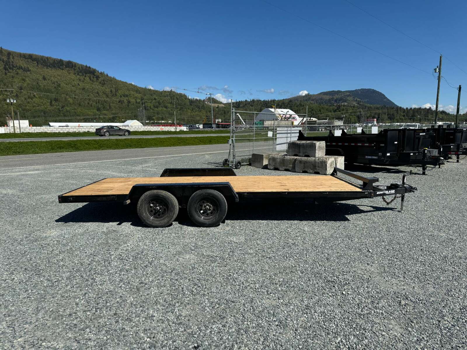 Photo of 2024 Southland 7X18 CAR TRAILER FLAT DECK 7,700LB GVW w/ Slide in Ramps