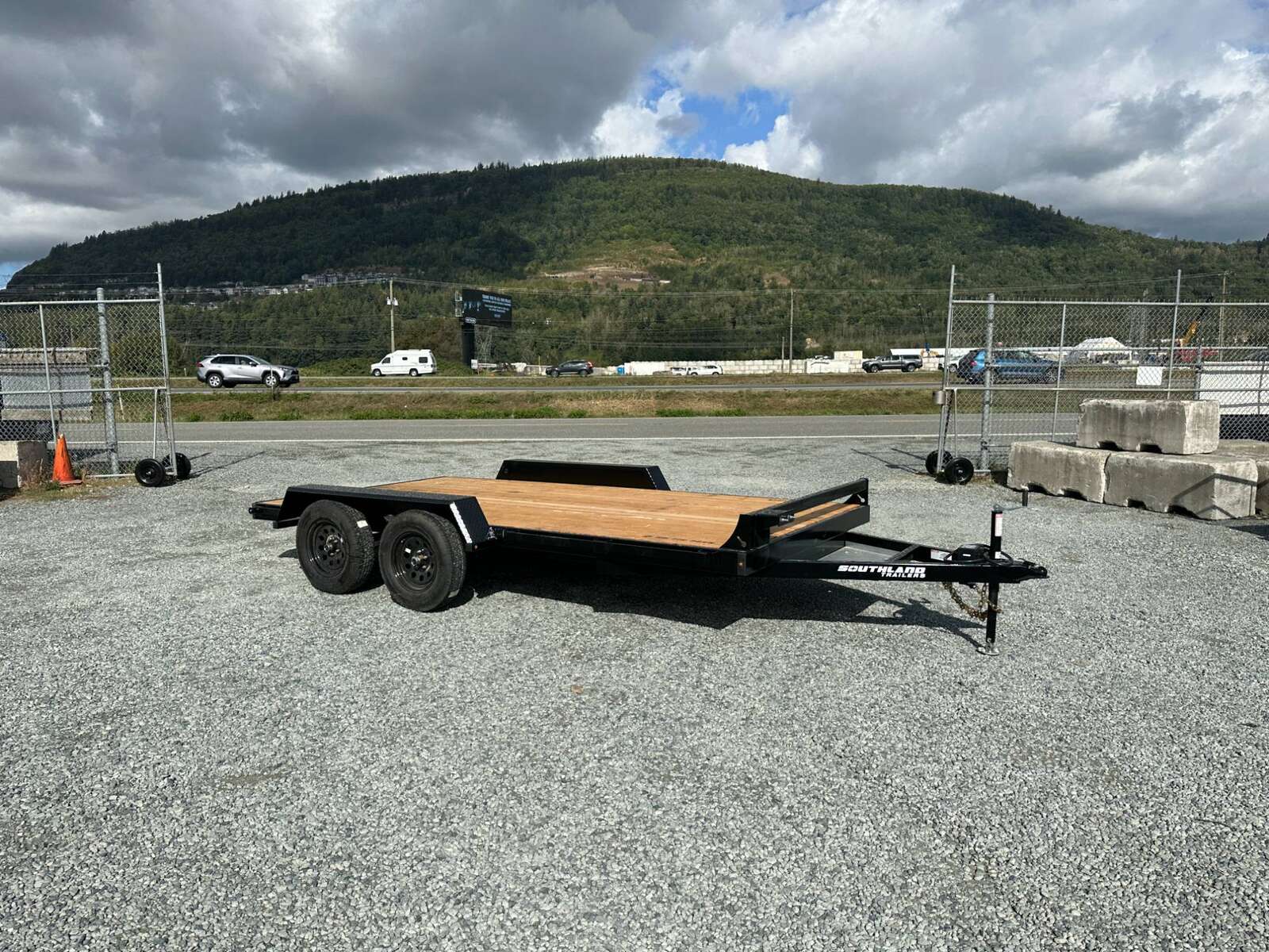 Photo of 2024 Southland 7X14 FLATBED TRAILER FLAT DECK 7,700LB GVW w/ Slide in ramps