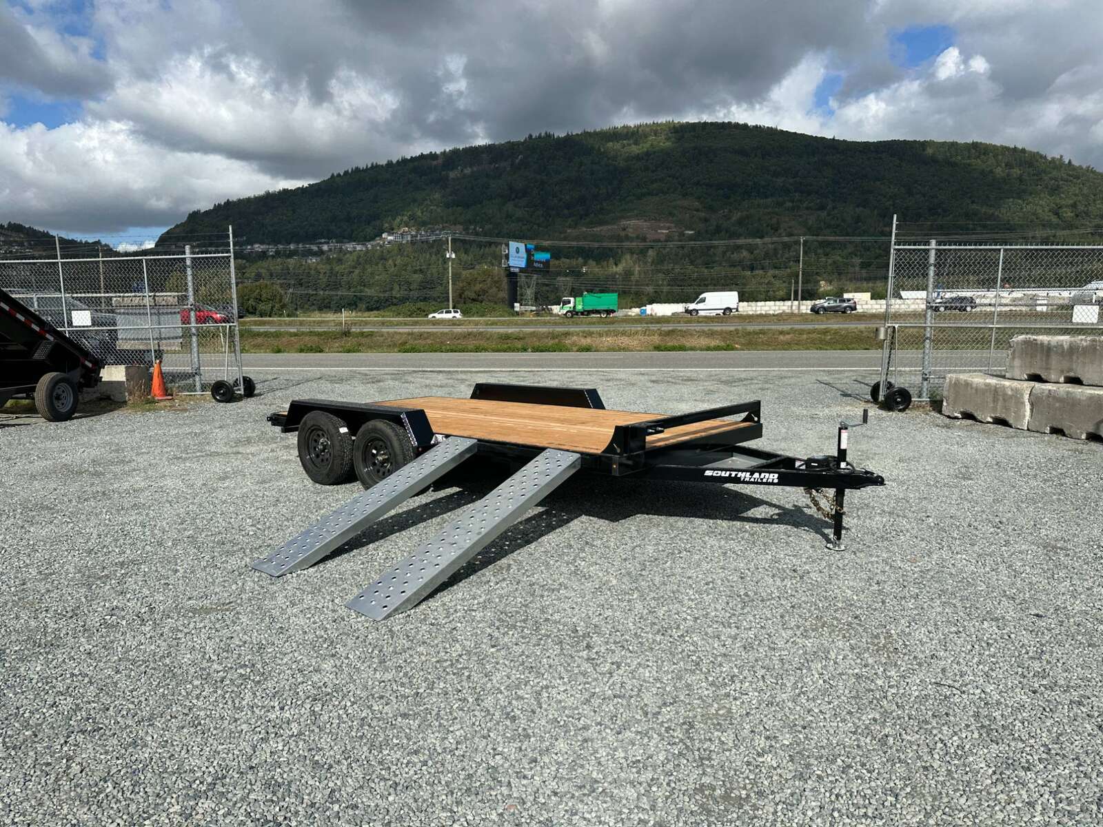 Photo of 2024 Southland 7X14 FLATBED TRAILER FLAT DECK 7,700LB GVW w/ Slide in ramps