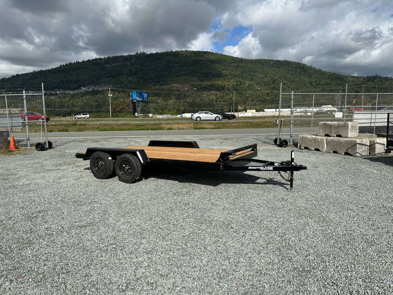 Photo of 2024 Southland 7X14 FLATBED TRAILER FLAT DECK 7,700LB GVW w/ Slide in ramps