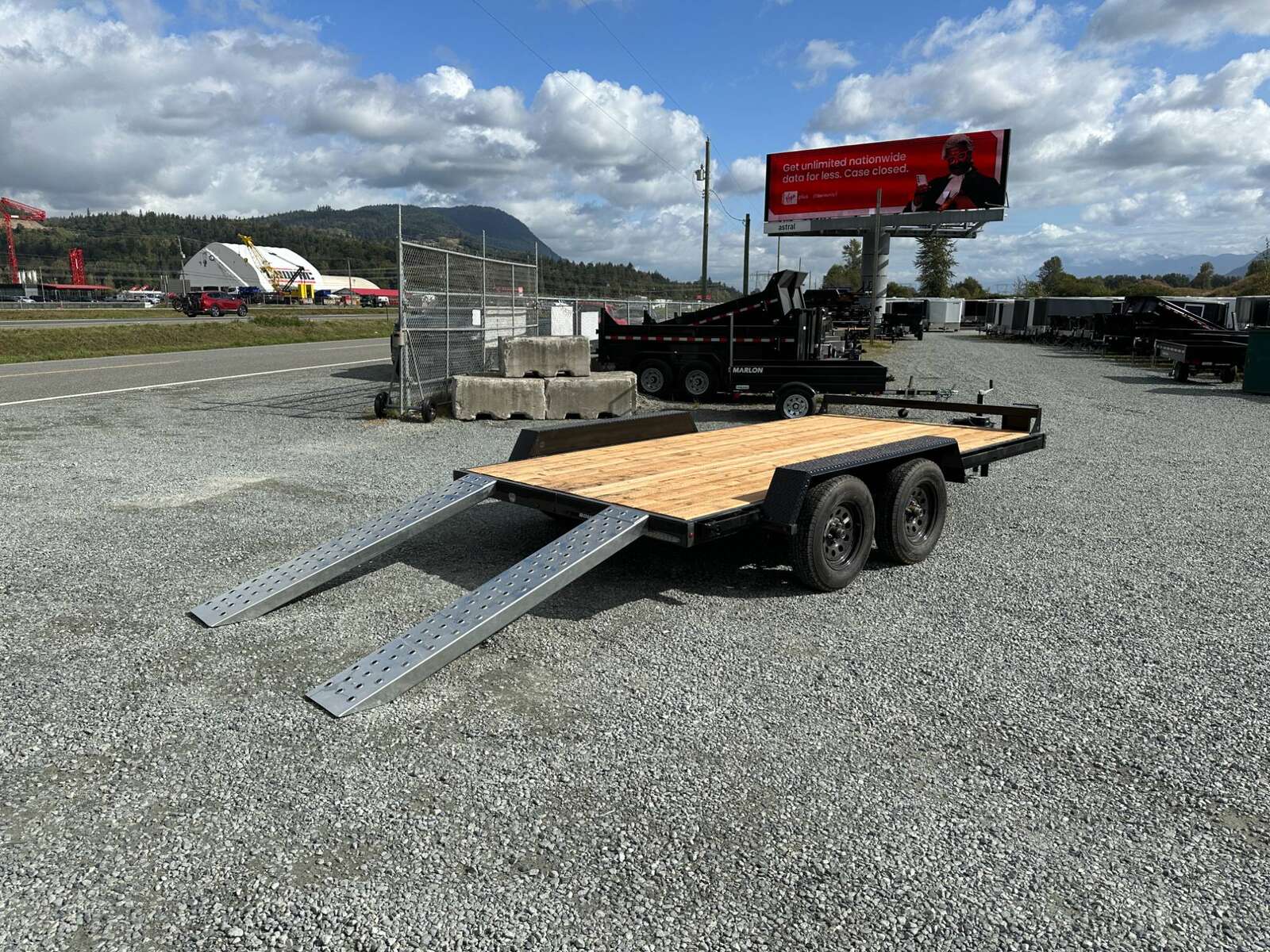 Photo of 2024 Southland 7X14 FLATBED TRAILER FLAT DECK 7,700LB GVW w/ Slide in ramps