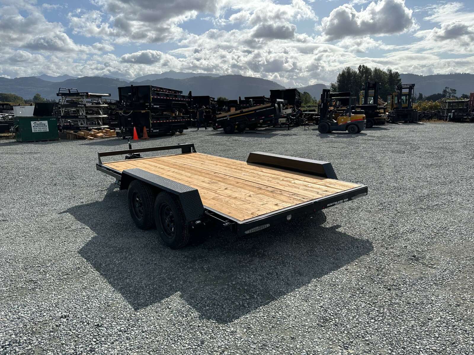 Photo of 2024 Southland 7X14 FLATBED TRAILER FLAT DECK 7,700LB GVW w/ Slide in ramps