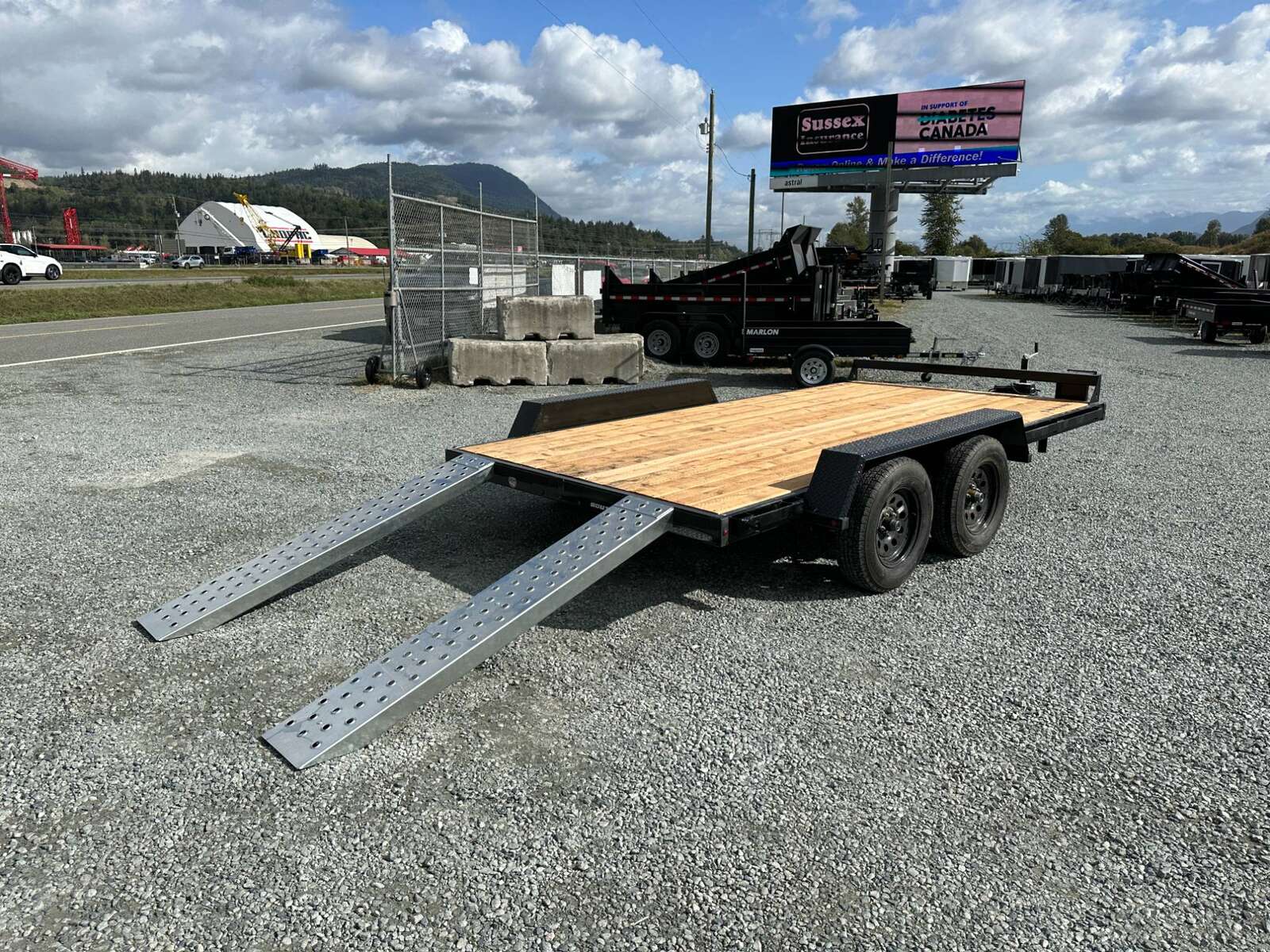 Photo of 2024 Southland 7X14 FLATBED TRAILER FLAT DECK 7,700LB GVW w/ Slide in ramps