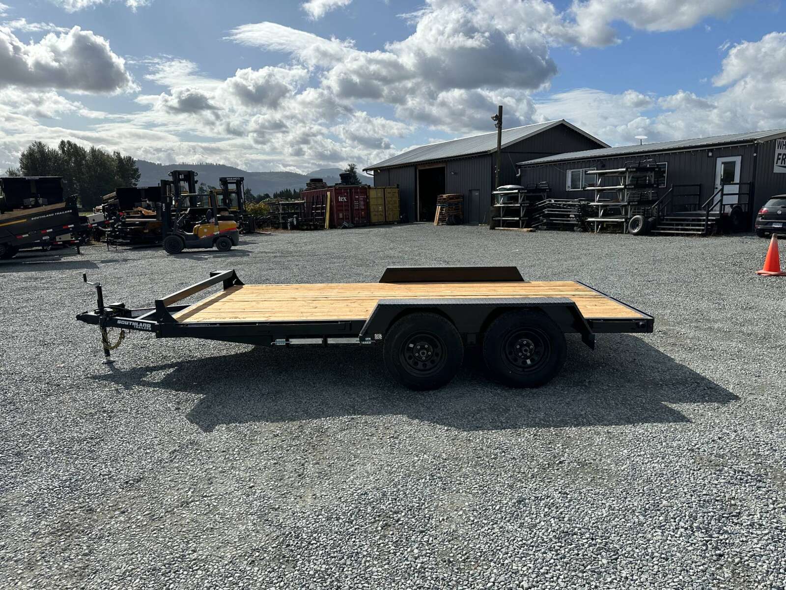 Photo of 2024 Southland 7X14 FLATBED TRAILER FLAT DECK 7,700LB GVW w/ Slide in ramps