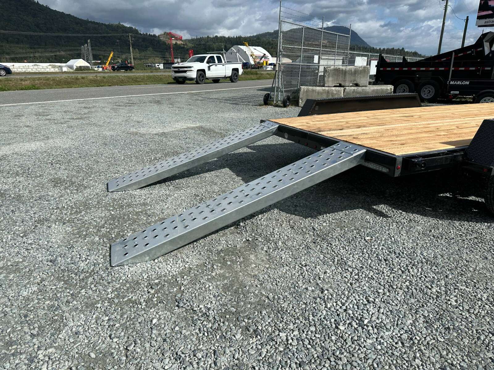 Photo of 2024 Southland 7X14 FLATBED TRAILER FLAT DECK 7,700LB GVW w/ Slide in ramps