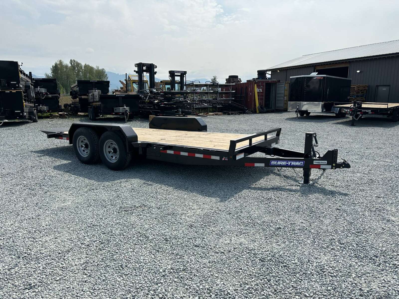 Photo of New Suretrac 7x18 HD Tilt Deck Equipment Trailer 14,000lb GVW