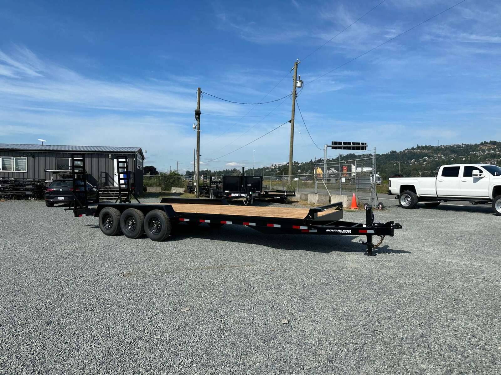 Photo of 2025 Southland Tri Axle Flatdeck 22 + 2' BEAVERTAIL 22,000LB GVW Equipment Trailer