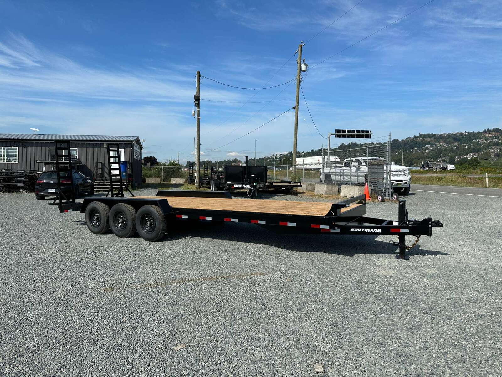 Photo of 2025 Southland Tri Axle Flatdeck 22 + 2' BEAVERTAIL 22,000LB GVW Equipment Trailer