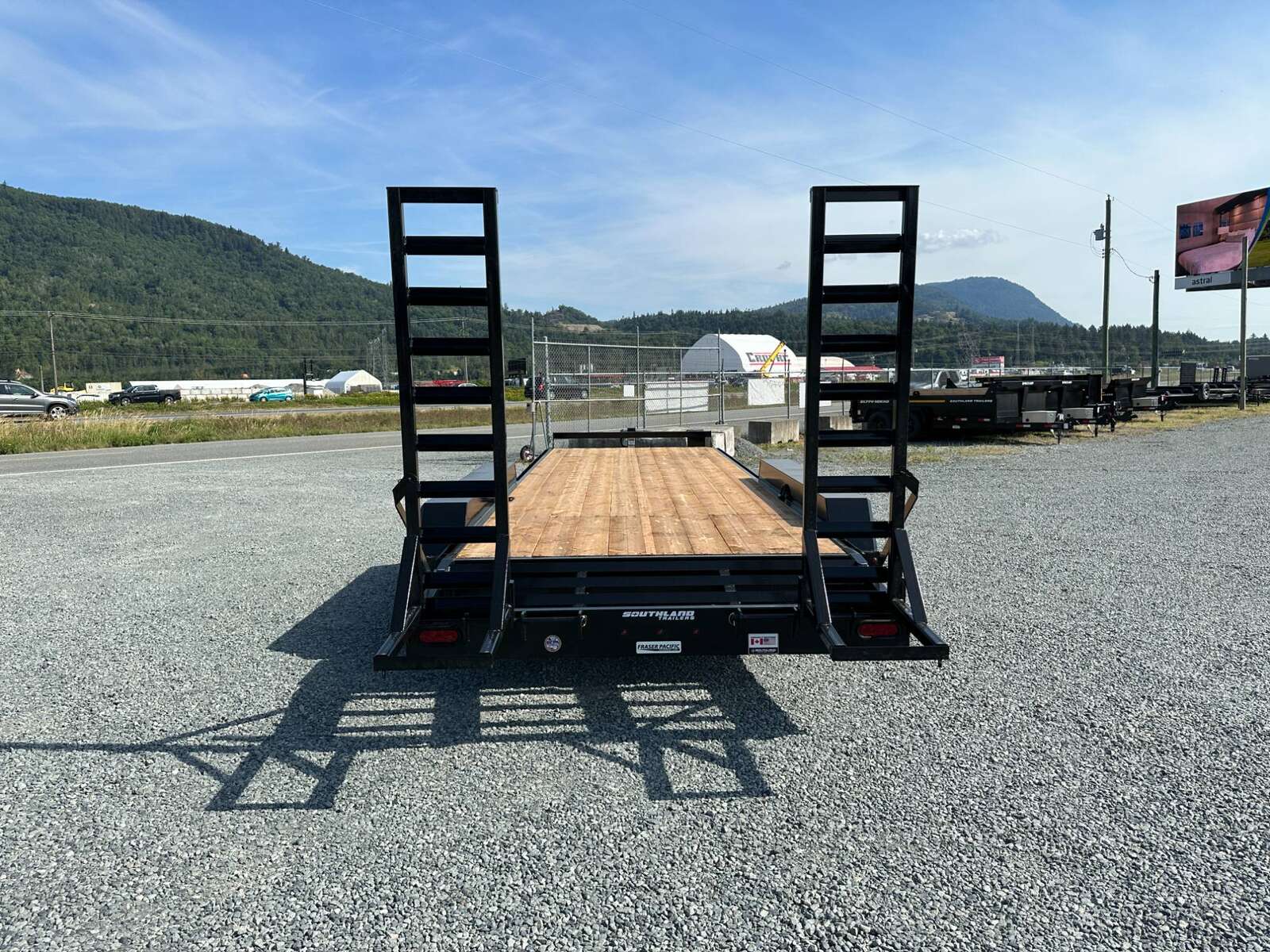 Photo of 2025 Southland Tri Axle Flatdeck 22 + 2' BEAVERTAIL 22,000LB GVW Equipment Trailer