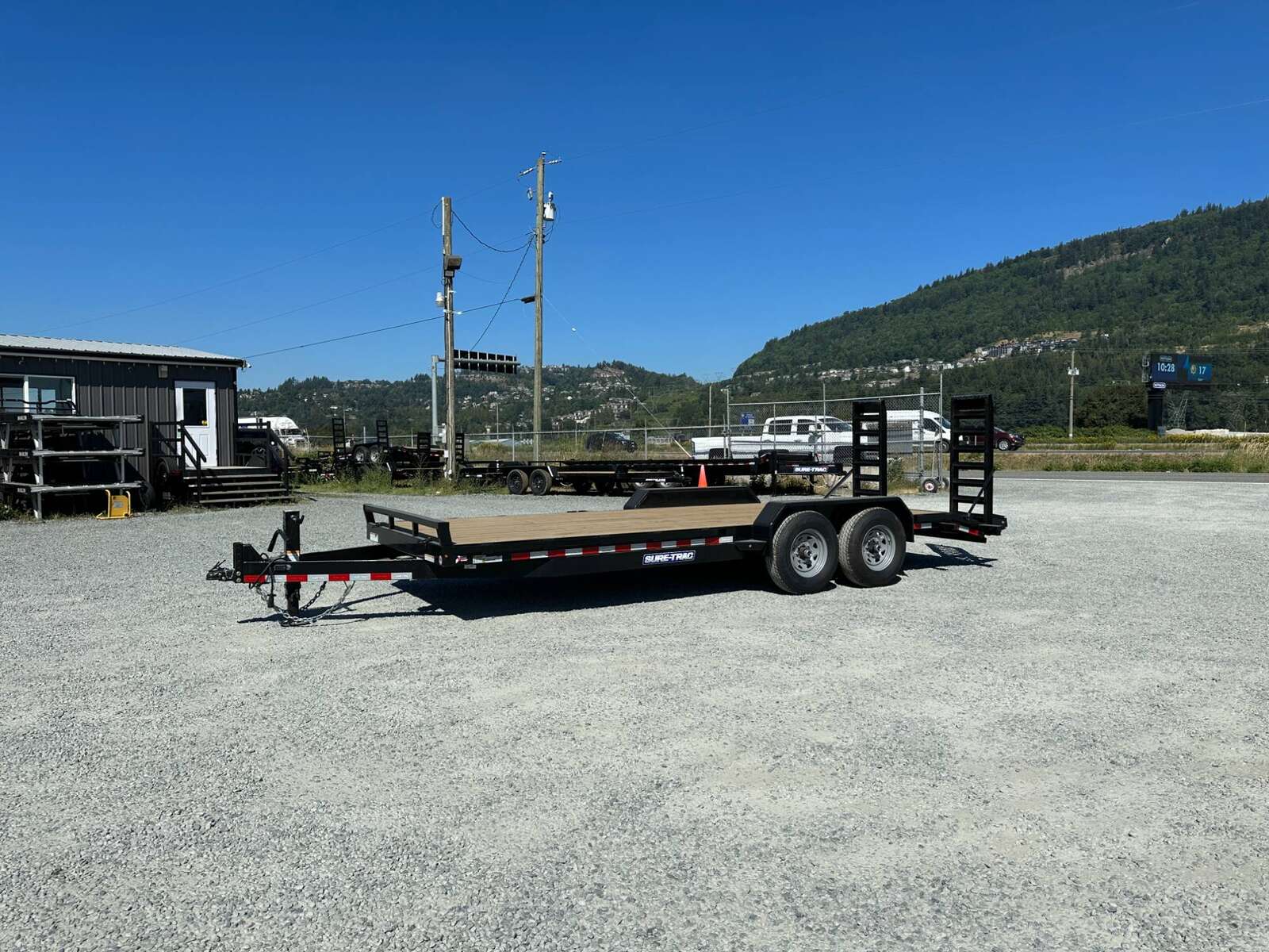 Photo of 2025 Suretrac 7x20 Equipment Trailer 14,000LB GVW Implement Flat Deck w/ Stand Up Ramps