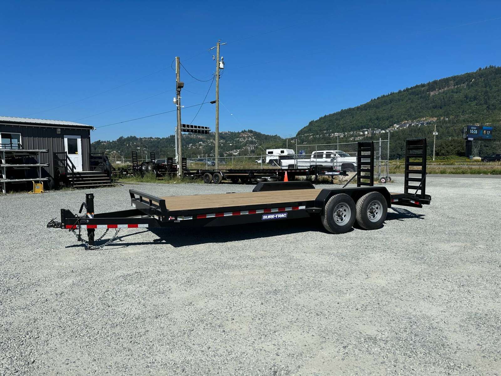 Photo of 2025 Suretrac 7x20 Equipment Trailer 14,000LB GVW Implement Flat Deck w/ Stand Up Ramps