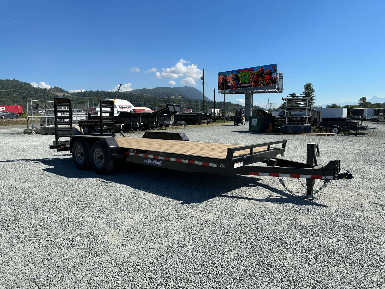 Photo of 2025 Suretrac 7x20 Equipment Trailer 14,000LB GVW Implement Flat Deck w/ Stand Up Ramps