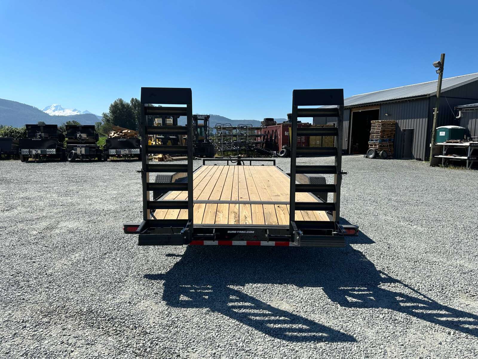 Photo of 2025 Suretrac 7x20 Equipment Trailer 14,000LB GVW Implement Flat Deck w/ Stand Up Ramps